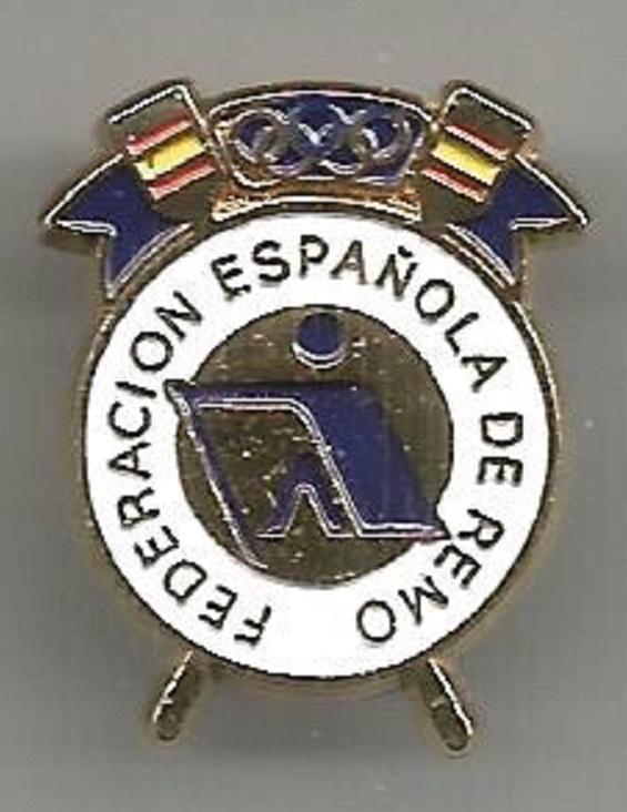 Pin ESP Spanish Rowing Federation pictogram in blue crossed golden oars with Olympic rings