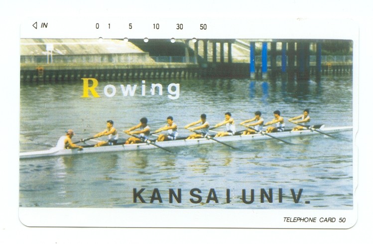 tc jpn kansai univ. rowing 8 crew in white boat on canal 